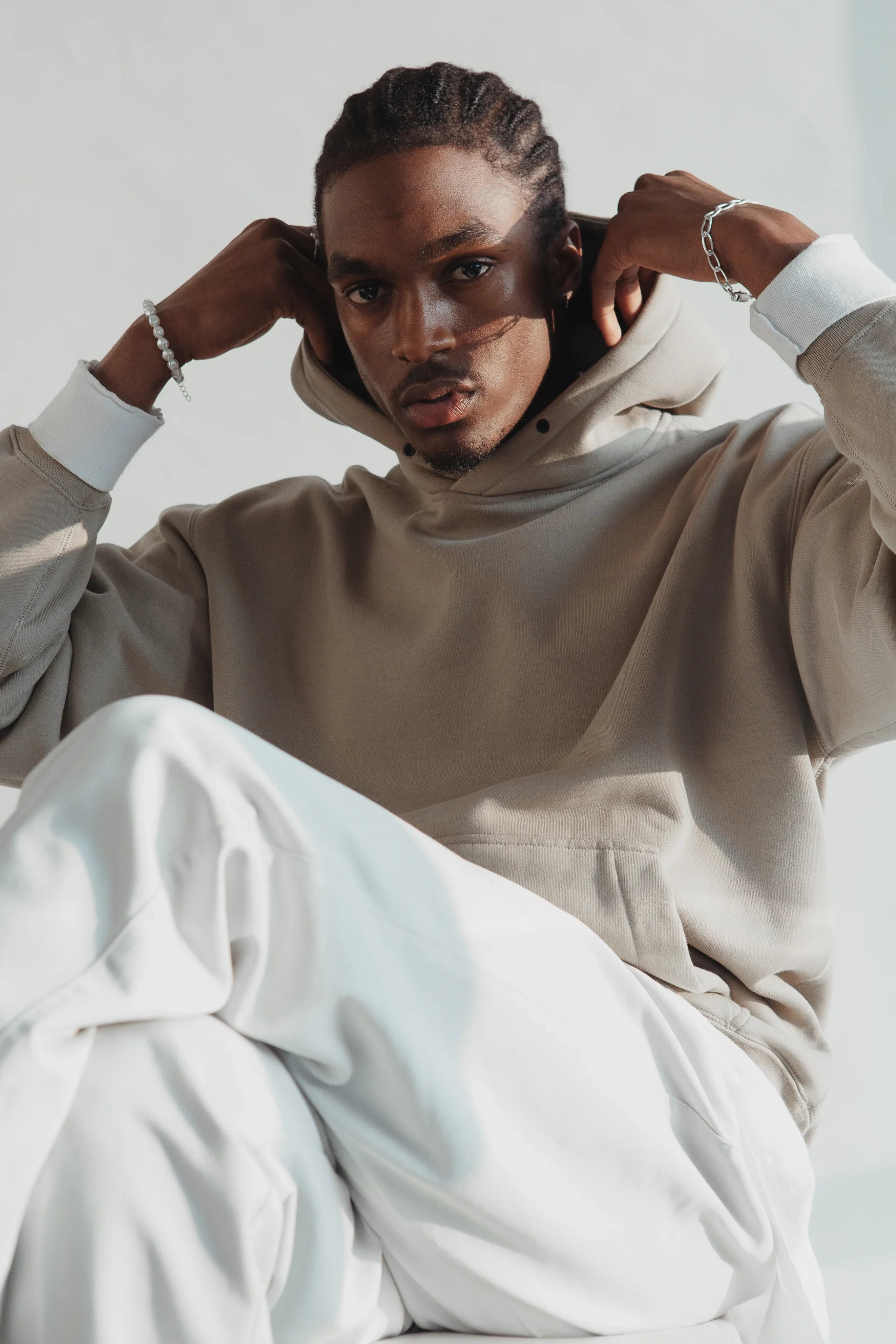 man-in-white-and-light-tan-outfit - SHIRT & CANVAS
